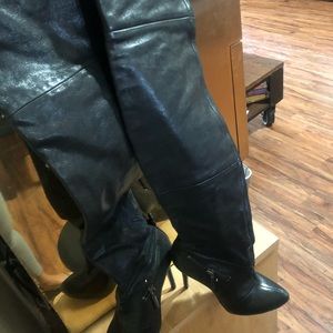 Thigh high black studded boots